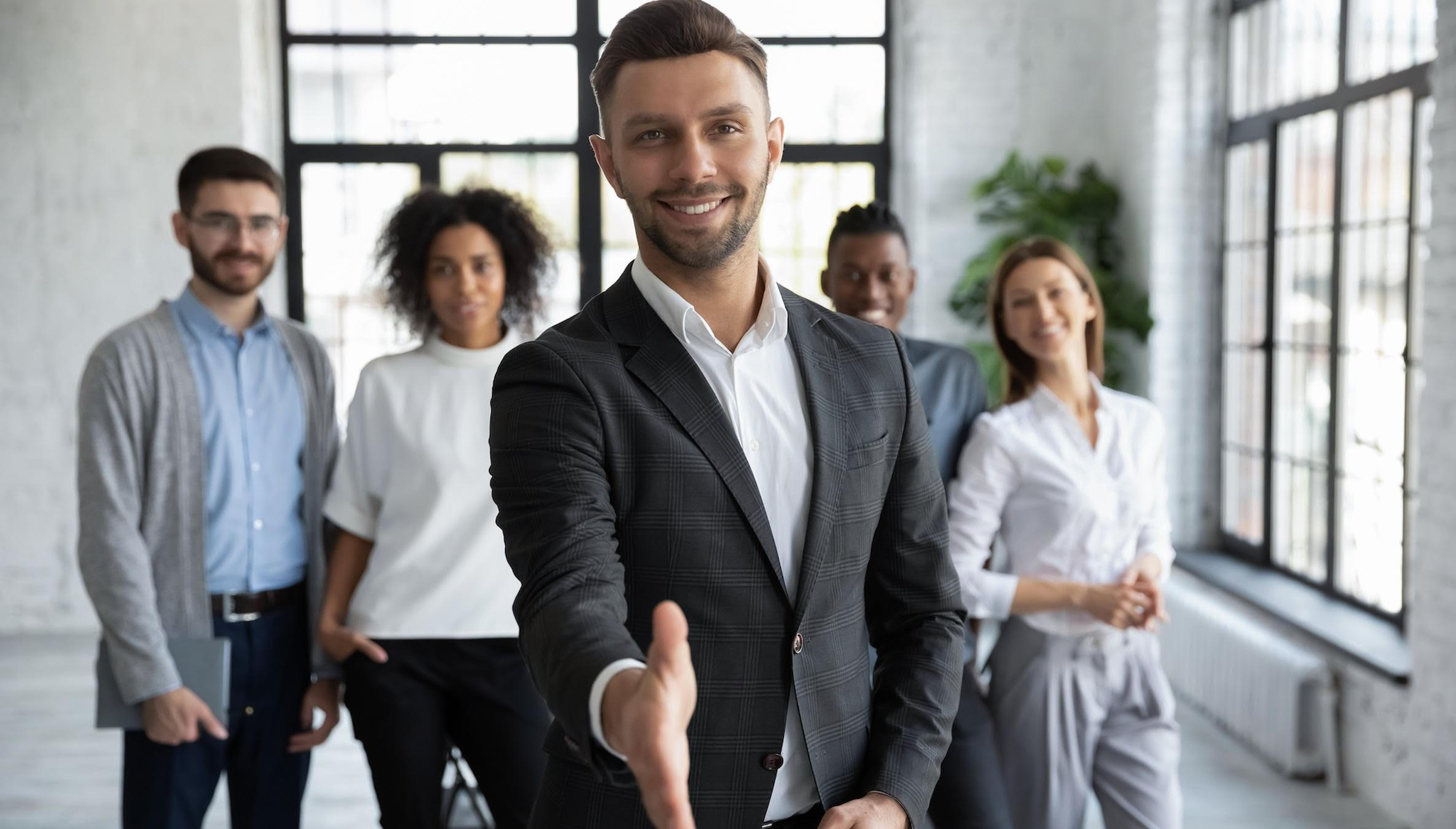 AV professional at mixing board